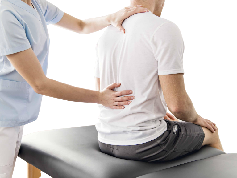 Doctor adjusting patient's back